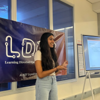 photo of undergraduate student presenting